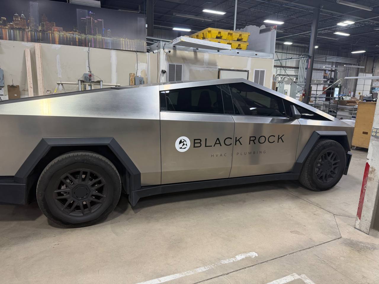 vehicle wrap installation Denver - Cybertruck Black Rock vinyl lettering side view