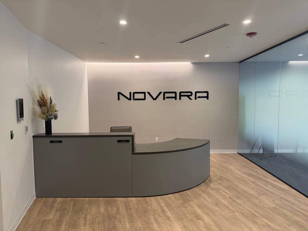 office reception signage and frosted glass installation Denver - Novara